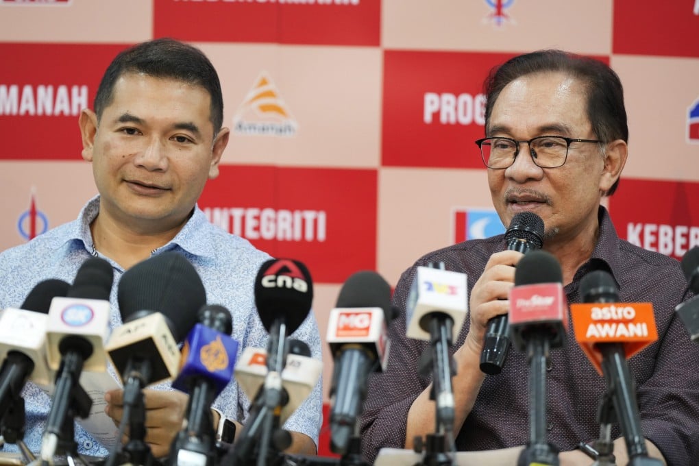 Rafizi Ramli (left), PKR’s then-deputy president, pictured at a press conference with Anwar Ibrahim in 2022. Photo: AP
