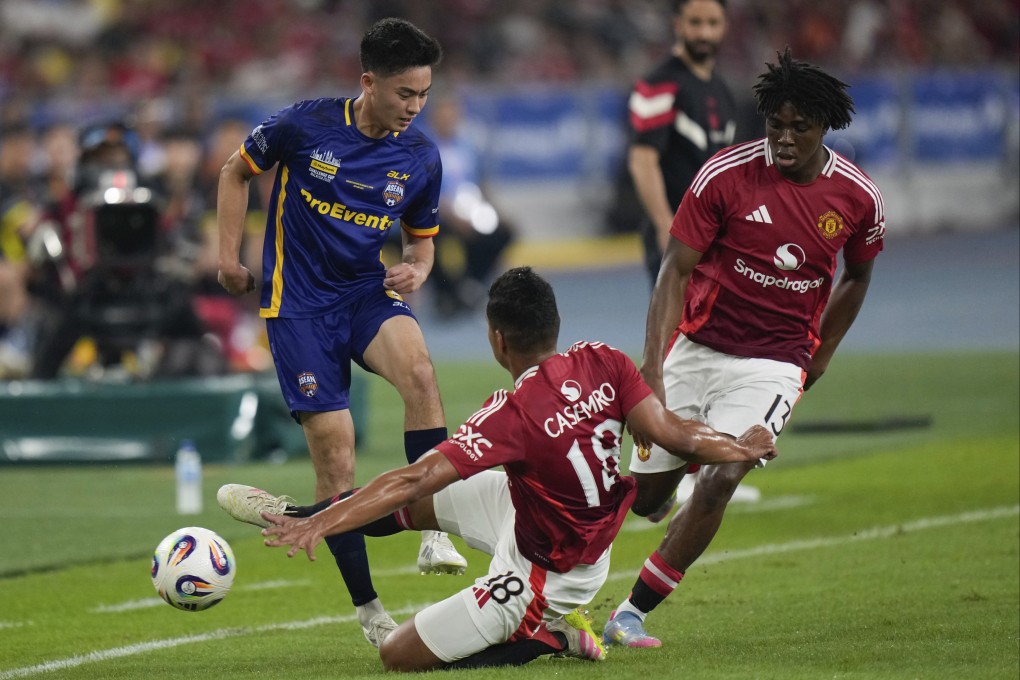Asean All-Stars’ Sandro Reyes (left) fights for the ball with Manchester United’s Casemiro (centre)  and Patrick Dorgu during a friendly in Kuala Lumpur. Photo: AP