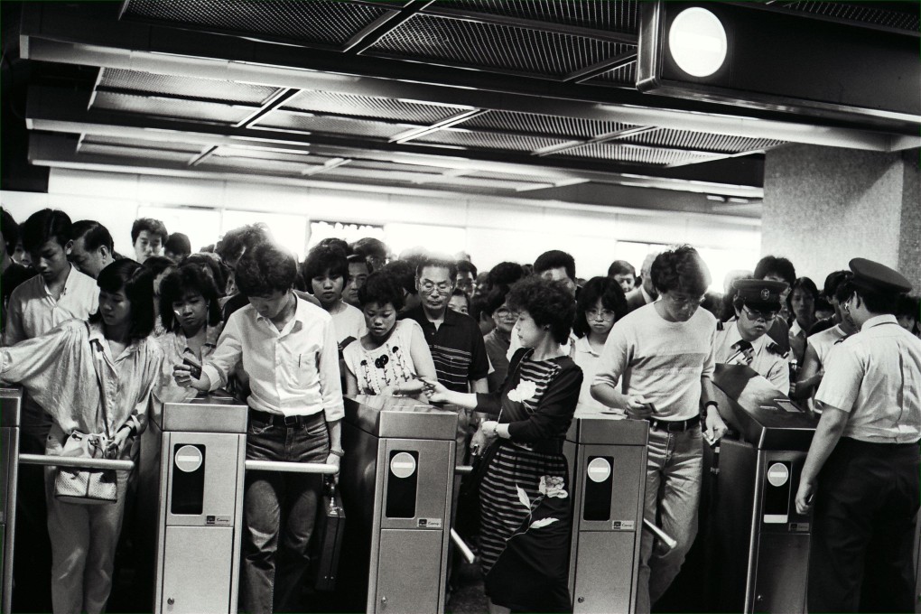 Turnstiles at one of the MTR’s stations keep turning as the Island line formally opened on May 31, 1985. Photo: Robin Lam