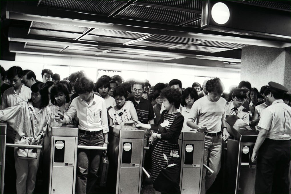 Turnstiles at one of the MTR’s stations keep turning as the Island line formally opened on May 31, 1985. Photo: Robin Lam