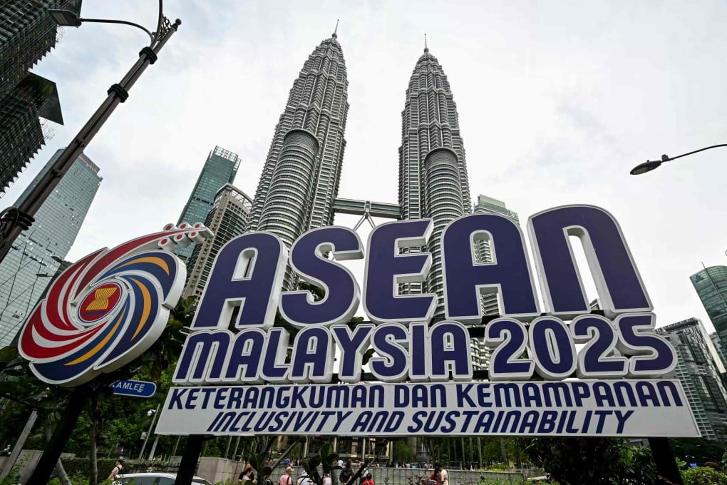 The Asean logo is pictured in front of Malaysia’s Petronas Twin Towers in Kuala Lumpur. Photo: AFP