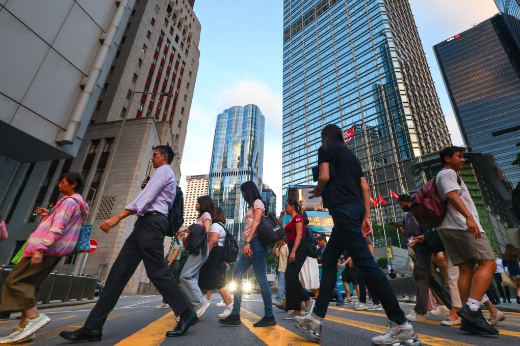 People cross the street in Hong Kong. All three major credit ratings firms have reaffirmed the fiscal strength of the city. Photo: Dickson Lee