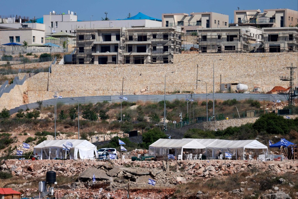 Tents set up by Israeli settlers in the Palestinian village of Bruqin, outside the walls of an illegal settlement of the same name, in the occupied-West Bank. Photo: AFP