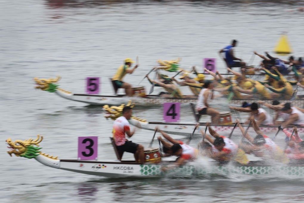 Dragon boat teams cross the finish line at the end of a race in Hong Kong’s Victoria Harbour in 2024. Dragon boat racing is one of the traditions of the Duanwu Festival, or Tuen Ng Festival, said to have arisen from the death of poet Qu Yuan in ancient China. Photo: Dickson Lee