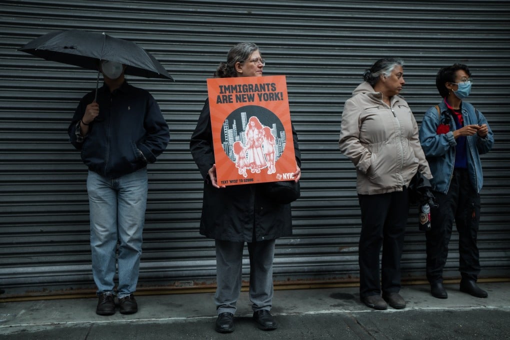 Protesters block a loading dock gate of an immigration court outside the Varick detention facility in Manhattan. Photo: EPA-EFE