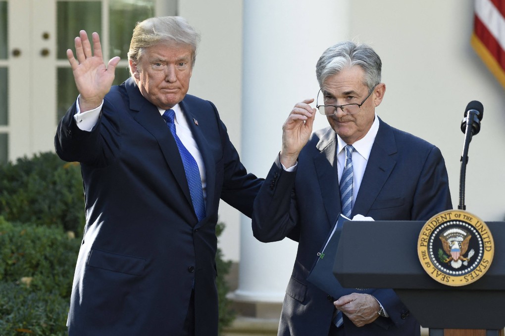 US President Donald Trump (left) signals the end of ceremony after announcing Jerome Powell (right) as nominee for Chairman of the Federal Reserve at the White House in November 2017. Photo: AFP