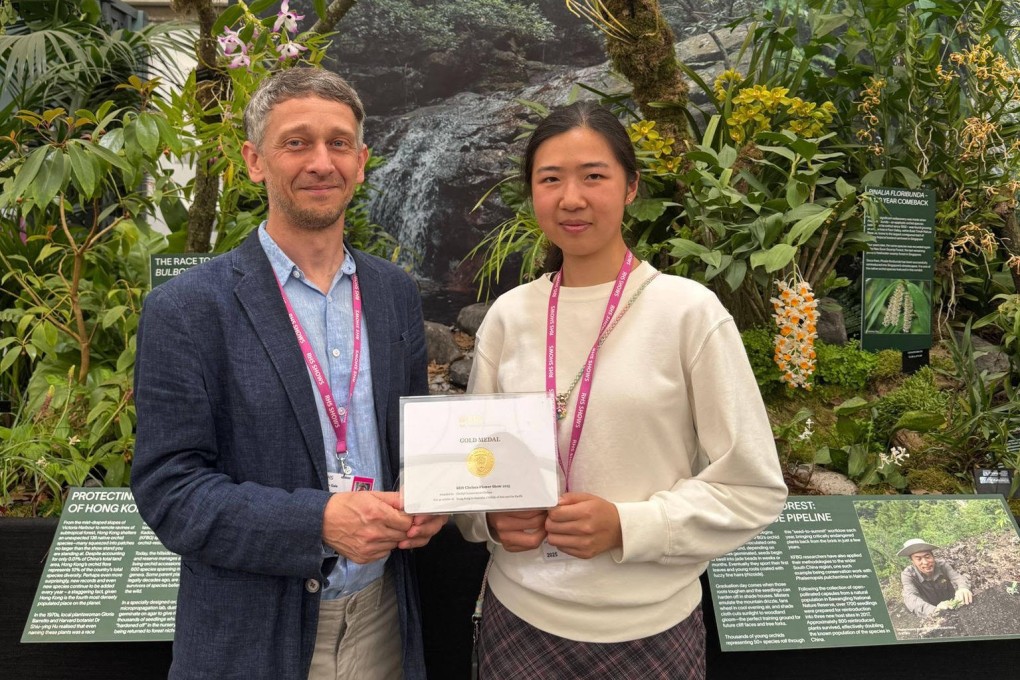 Kadoorie Farm’s Stephan Gale and Candy Ip with the prized gold medal from the Chelsea Flower Show. Photo: Cliff Buddle