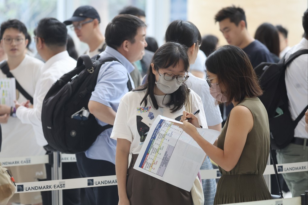 Potential buyers at the sales office of  Uni Residence at AIA Kowloon Tower in Kwun Tong. Photo: Edmond So