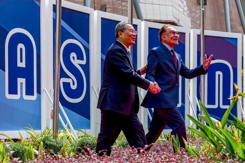 Malaysia’s Prime Minister Anwar Ibrahim (right) gestures as he welcomes China’s Premier Li Qiang ahead of the Asean summit in Kuala Lumpur on Tuesday. Photo: handout