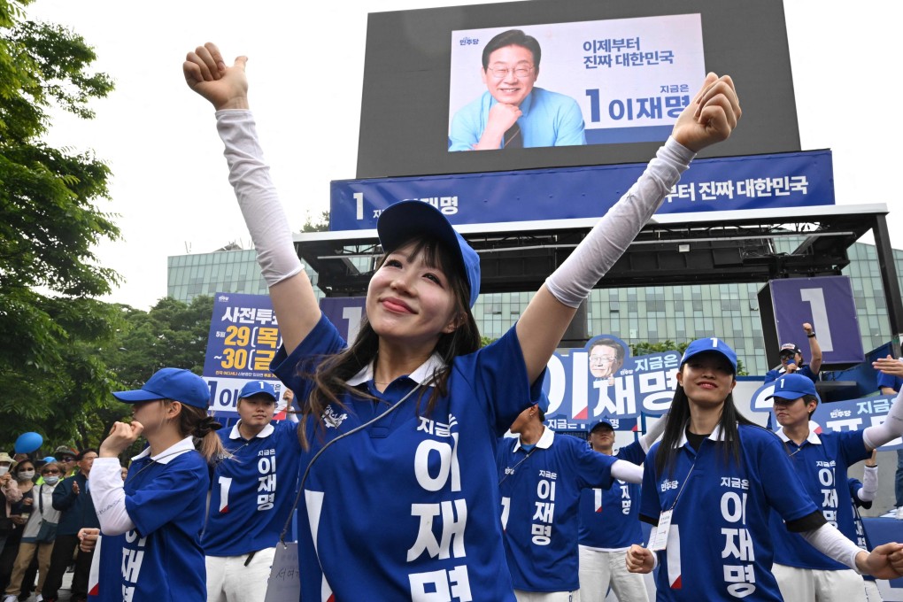 Supporters of South Korean presidential candidate Lee Jae-myung dance during an election campaign event on Wednesday. Photo: AFP