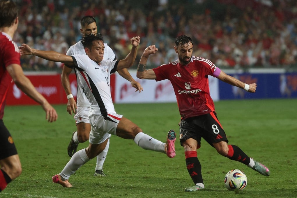 Star attraction Bruno Fernandes shoots under close attention from Ngan Cheuk-pan. Photo: Reuters