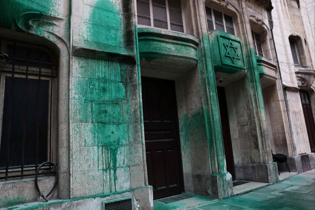 Green paint thrown on the walls of the Agoudas Hakehilos synagogue in Paris on Saturday. Photo: AFP