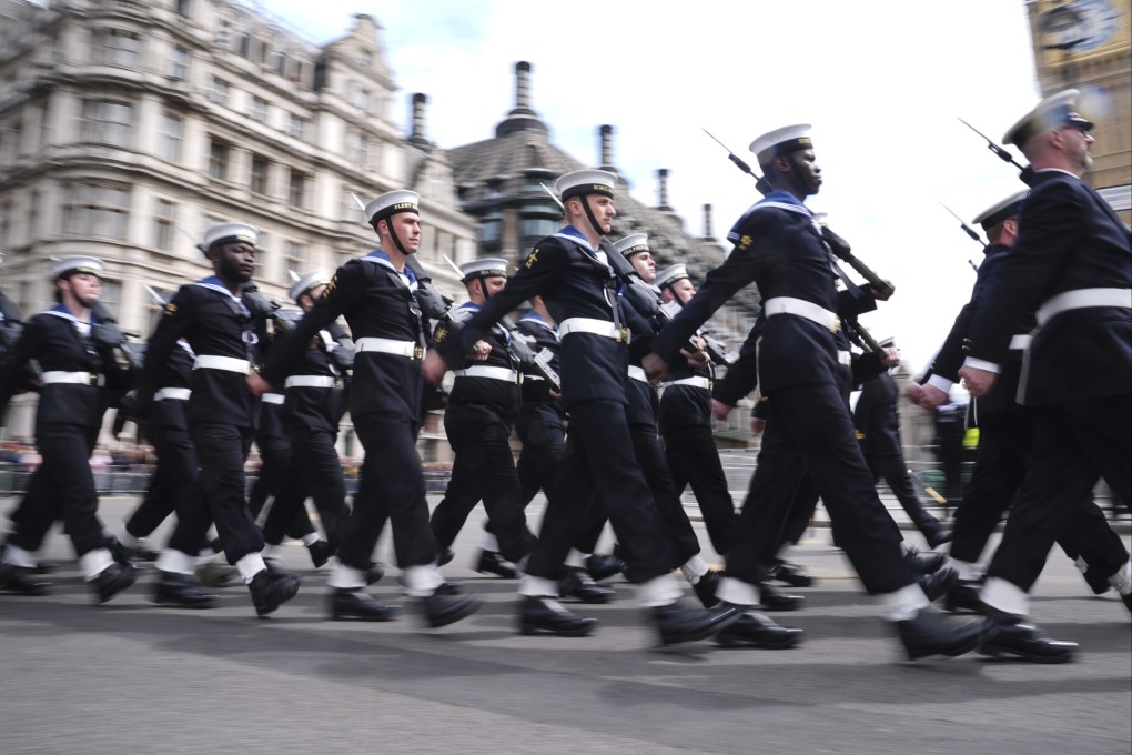 Members of Britain’s navy march during a parade in London on May 5. The country is set to unveil a new defence strategy that will outline the biggest threats it faces. Photo: AP