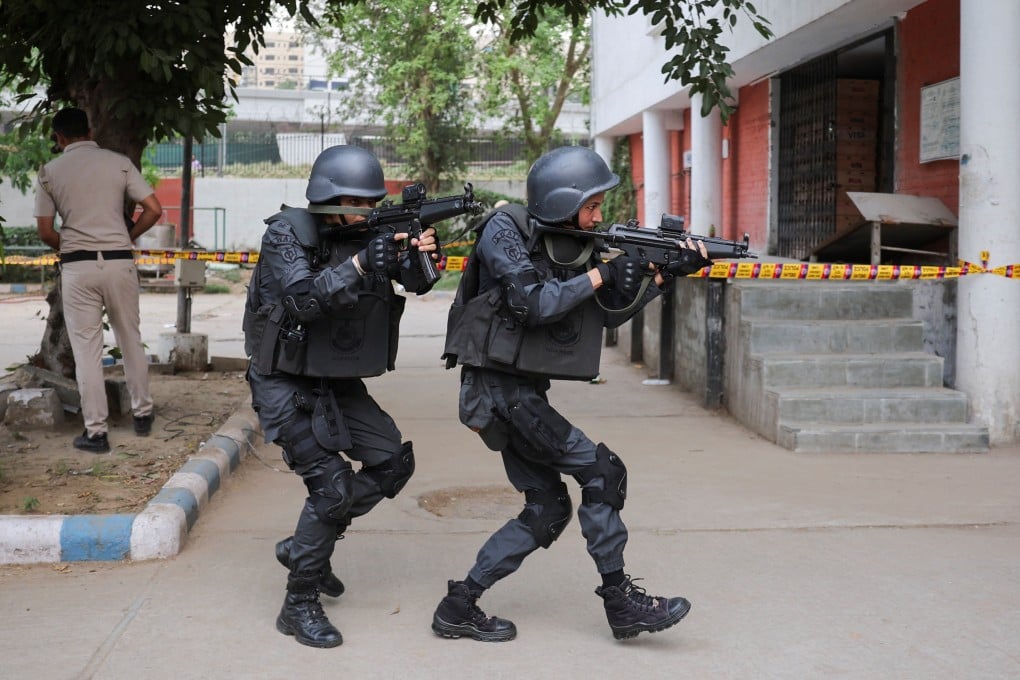 Members of the Delhi Police SWAT team participate in a mock drill exercise on May 16. Photo: Reuters