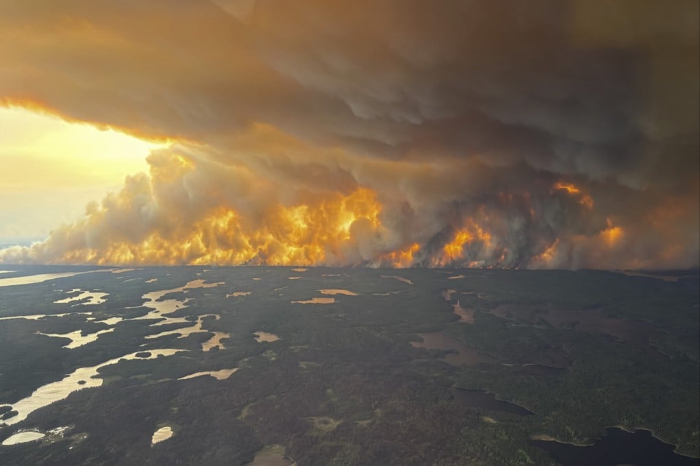 A large wildfire in Flin Flon, Manitoba, Canada. Thousands of people in the area have been evacuated from their homes and Manitoba has declared a state of emergency. Photo: Government of Manitoba / EPA-EFE