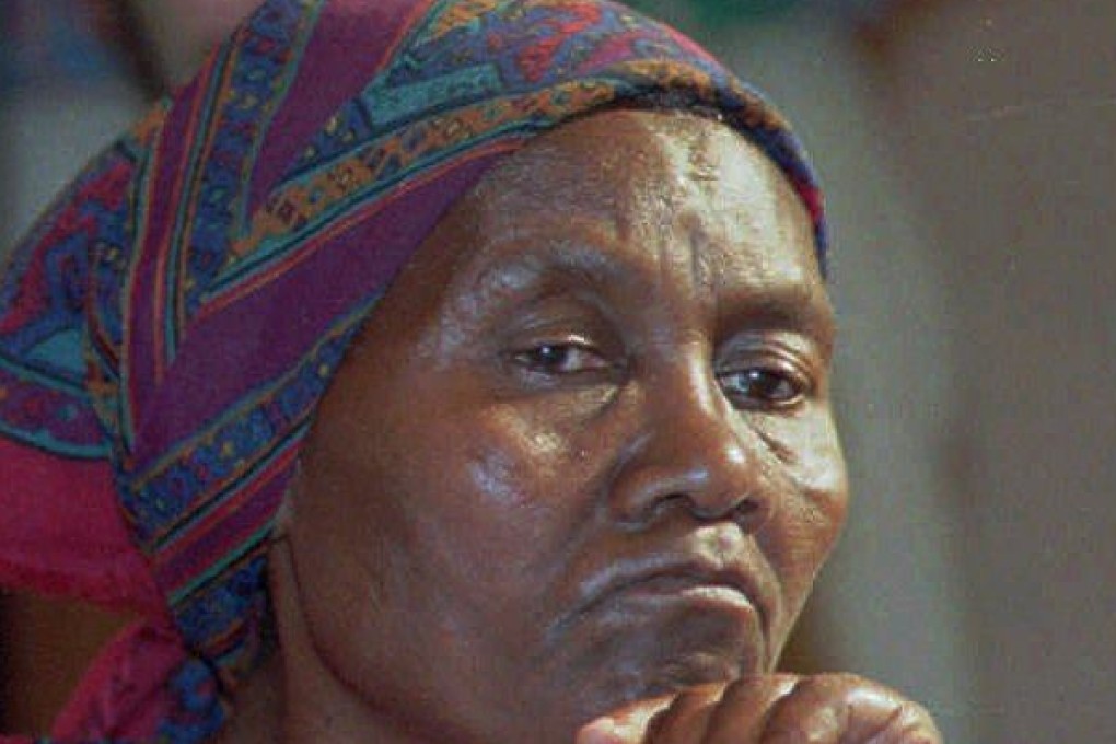 Elizabeth Hashe, wife of murdered anti-apartheid activist Sipho, at a press briefing in 1997. Apartheid was a racist system that treated black people differently to white people. Some are still hoping for justice, decades on. Photo: AP