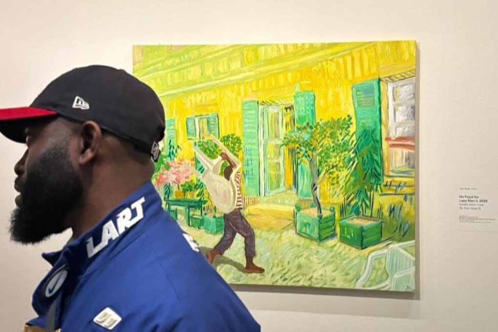 Nigerian artist John Madu stands in front of one of his paintings at the Van Gogh Museum in Amsterdam, where his solo exhibition “Paint Your Path” opened on May 30. Photo: Instagram/johnmadu_art
