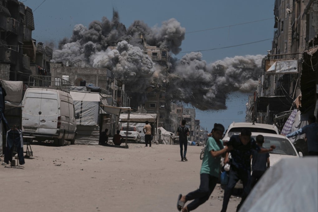Smoke rises following an Israeli strike in Gaza City on Sunday. Photo: AP