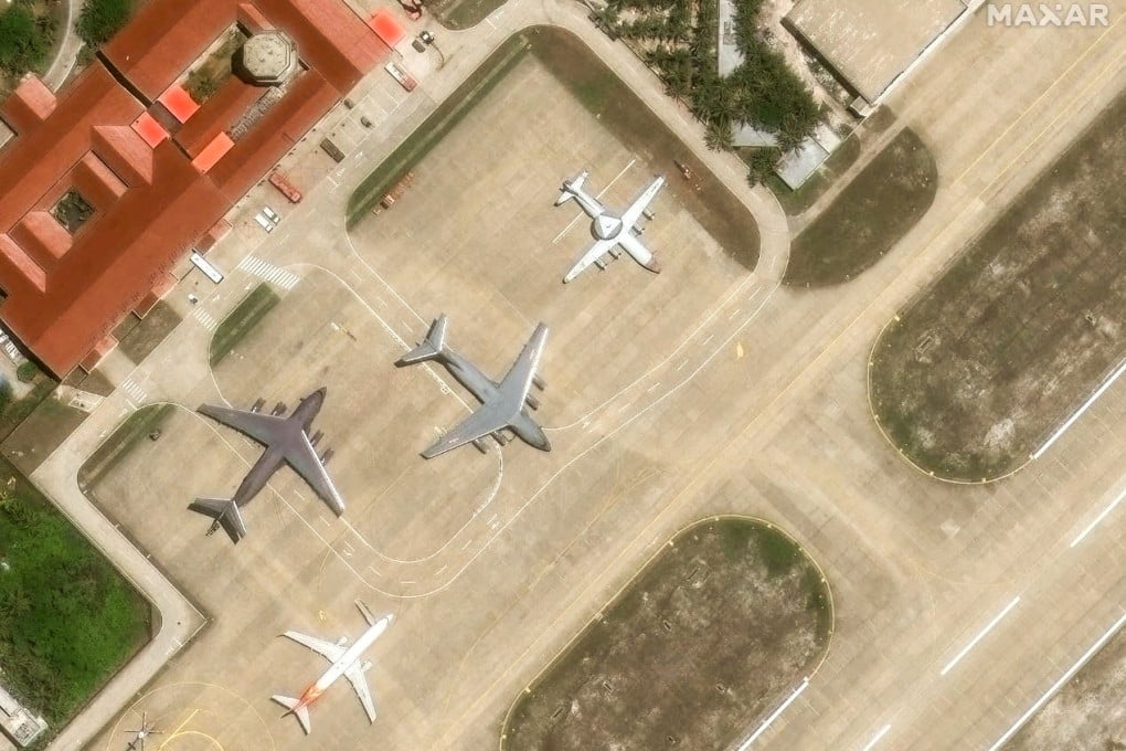 Chinese military aircraft are pictured parked on the tarmac of an airfield on Woody Island, in the disputed Paracel archipelago in the South China Sea, on May 19. Photo: Maxar Technologies/Reuters
