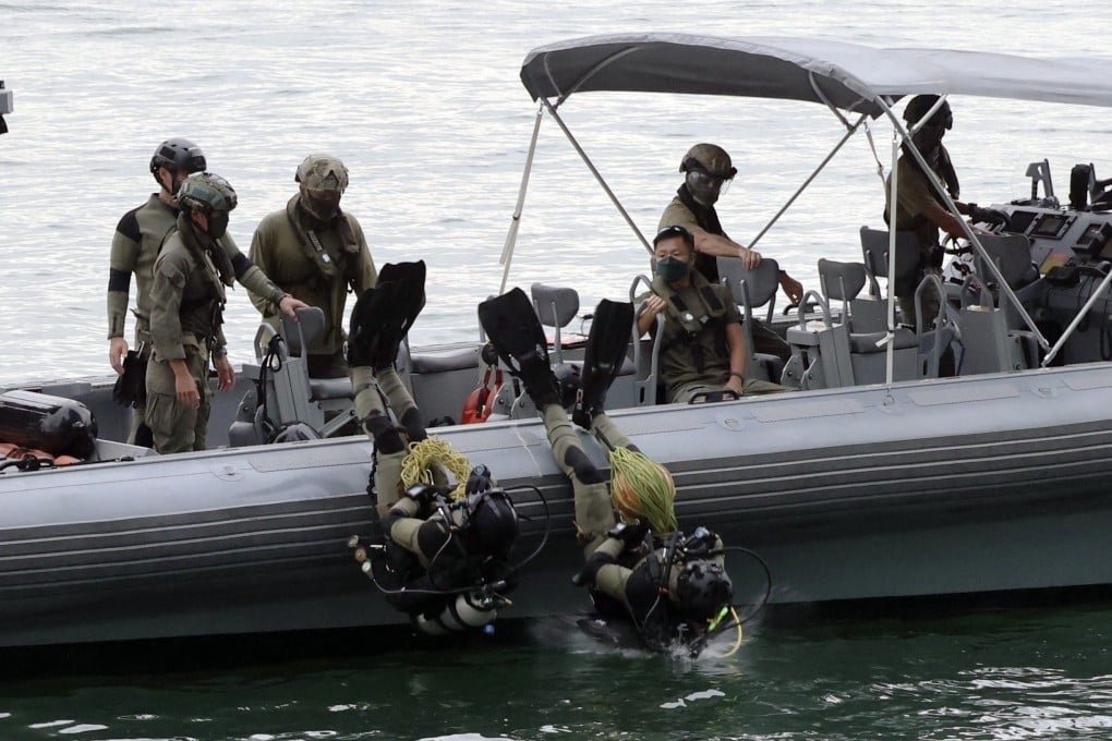 Divers from Hong Kong’s Flying Tigers search for evidence in a national security case. Photo: Jelly Tse
