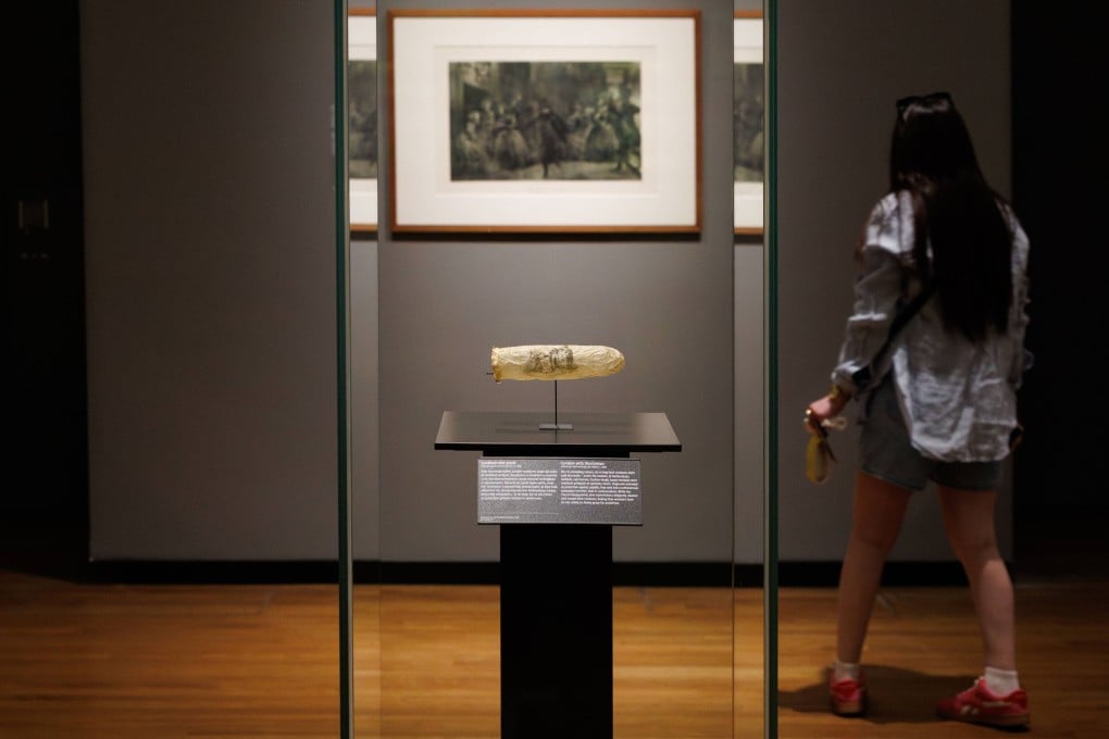 A condom made around 1830 and emblazoned with erotic art on display at Amsterdam’s Rijksmuseum. Photo: Rijksmuseum via AP