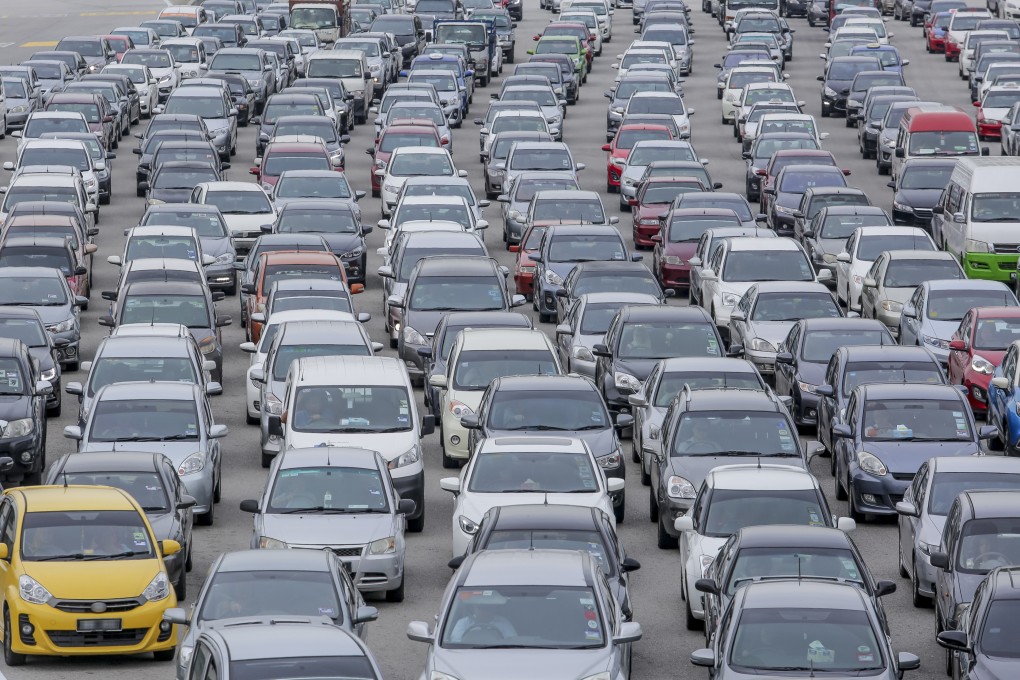 Cars on the highway during a traffic jam in Kuala Lumpur, Malaysia. Photo: Shutterstock