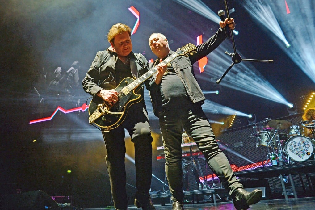 Jim Kerr (right) and Charlie Burchill of Simple Minds on stage at Wembley Arena, London, in 2022. Photo: Getty Images