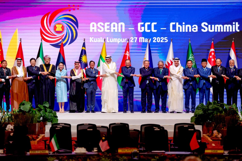 Leaders join hands before the Asean-GCC-China Summit in Kuala Lumpur, Malaysia, on May 27. Photo: EPA-EFE