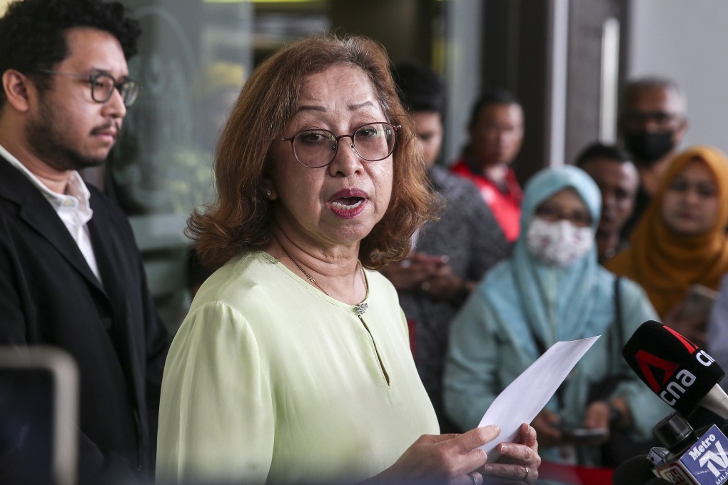 Naimah Khalid, widow of former Malaysian finance minister Daim Zainuddin, speaks to the media after a court appearance in Kuala Lumpur in January last year. She was charged with failing to declare assets under the MACC Act and released on bail. Photo: EPA-EFE