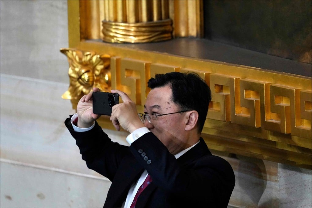 Xie Feng, China’s ambassador to the US, takes a picture during Donald Trump’s inauguration earlier this year. Photo: AFP