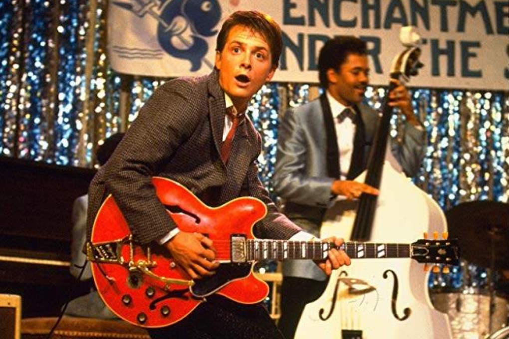 Marty McFly (Michael J. Fox) plays a Cherry Red Gibson ES-345 in the high-school dance scene from 1985’s Back to the Future. A search is on for the guitar as the film’s 40th anniversary nears. Photo: Facebook/Do You Remember?