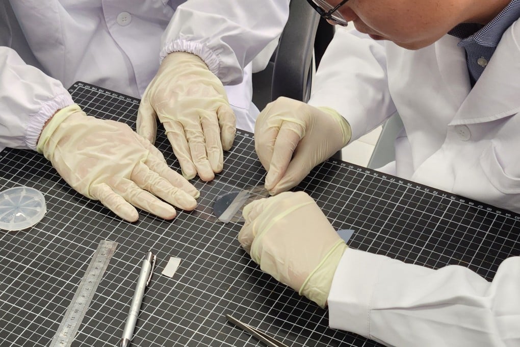 University of Hong Kong students work on a groundbreaking diamond membrane technology on December 19, paving the way for its mass production and widespread use in electronics. Photo: Holly Chik