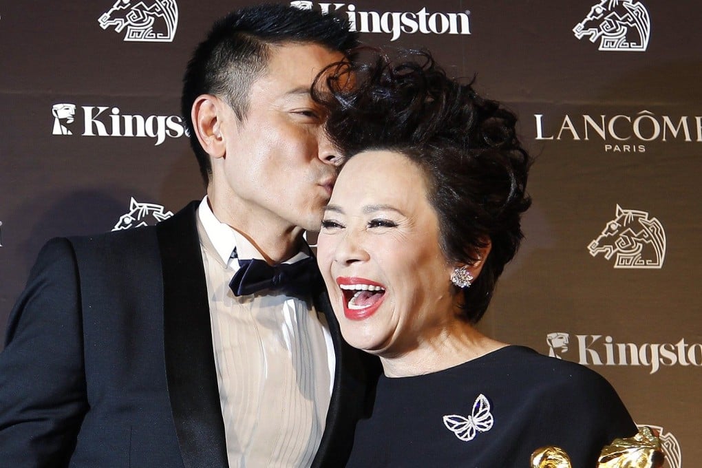 Andy Lau kisses Deanie Ip as the pair celebrate winning the best actor and best actress awards for A Simple Life at the 2011 Golden Horse Film Awards in Hsinchu, Taiwan, on November 26, 2011. Photo: Reuters