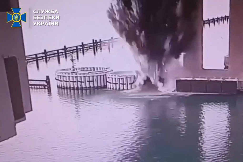 Footage released by the SBU allegedly shows an explosion at the bridge connecting Crimea with Russia on Tuesday. Photo: Ukrainian Security Service via AFP