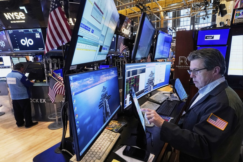 A trader works on the floor of the New York Stock Exchange on Tuesday. Section 899 of Washington’s “big beautiful bill” reflects the US’ increasing readiness to leverage its dominance in the global capital market. Photo: AP