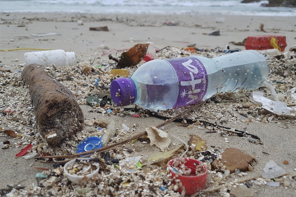 Plastic bottles, caps, and polystyrene washed up onto Big Wave Bay beach in Shek O, Hong Kong. Plastic debris breaks down into microplastics which enter the food chain and eventually the human body, disrupting its function and damaging organs. Photo: Antony Dickson