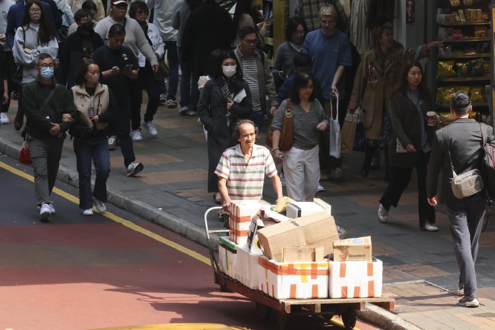 A cleaning worker is seen in Tsim Sha Tsui. Photo: Jelly Tse