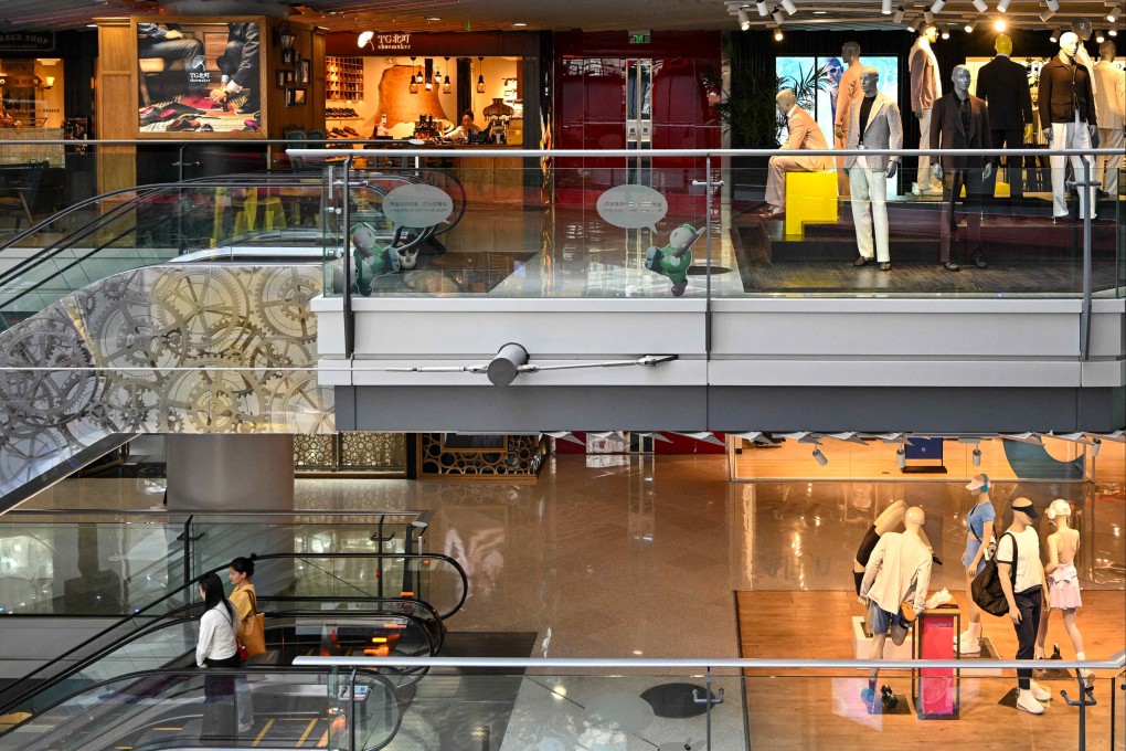 People visit a shopping mall in Beijing on May 28, 2025. Photo: AFP