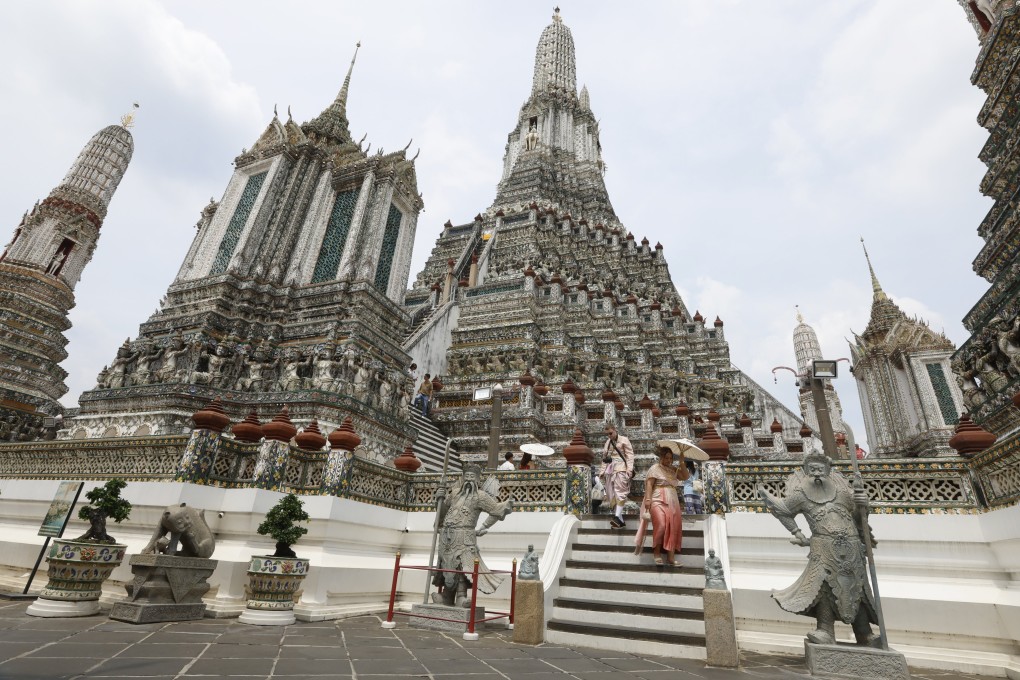 Tourists visit a temple in Bangkok, Thailand, on May 22. Photo: EPA-EFE