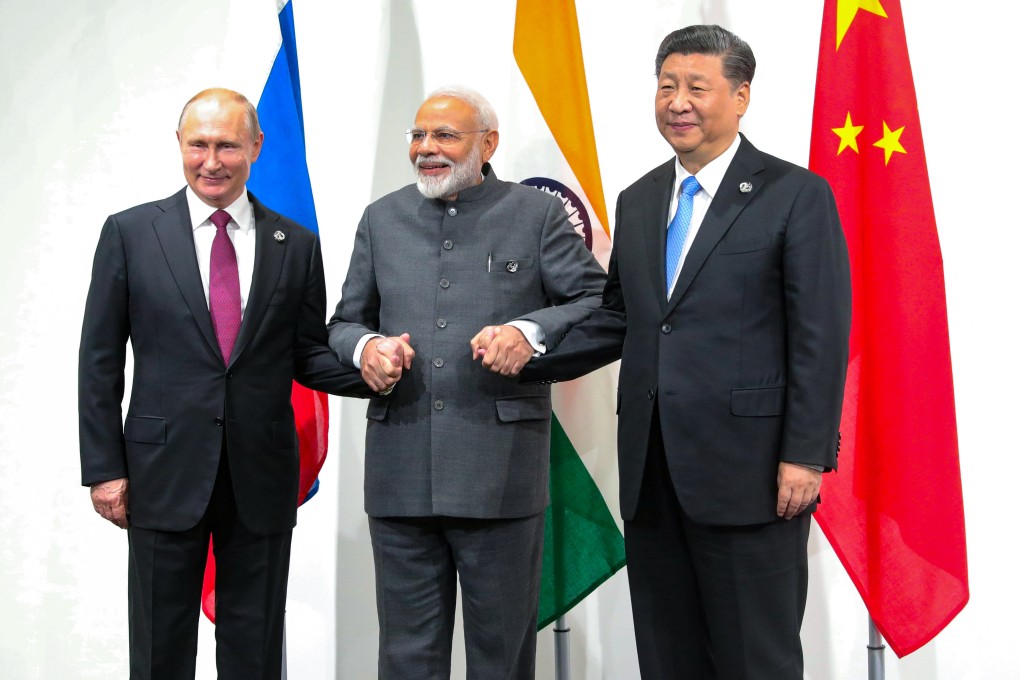 Russia’s President Vladimir Putin (left), India’s Prime Minister Narendra Modi and China’s President Xi Jinping met on the sidelines of the G20 summit in Osaka on June 28, 2019. Attempts to reform a triumvirate against the US-led West face obstacles within and outside the trio. Photo: Sputnik/Reuters