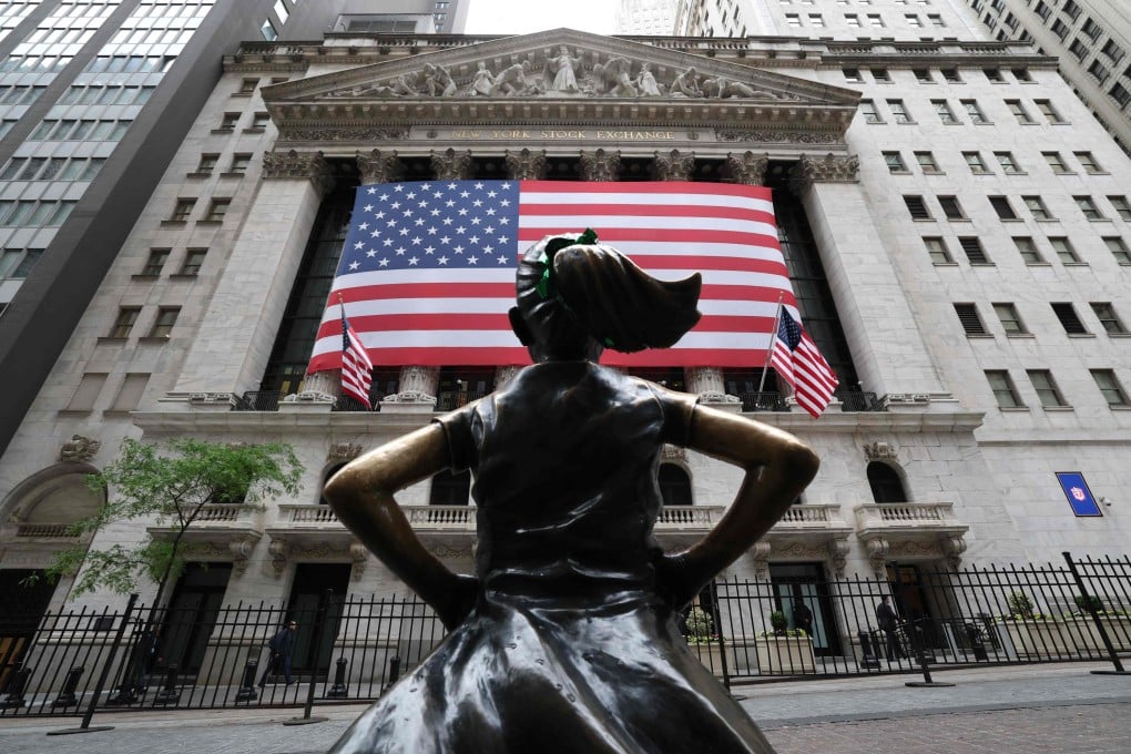 The Fearless Girl sculpture is seen outside the New York Stock Exchange in May. Photo: AFP