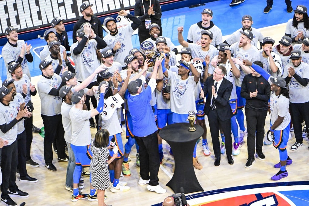 The Oklahoma City Thunder players celebrate winning the Western Conference finals after victory in Game 5 gave them a 4-1 overall triumph against the Minnesota Timberwolves. Photo: EPA