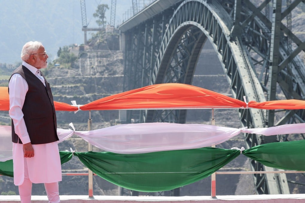 Indian Prime Minister Narendra Modi stands at a view point of the Chenab Bridge on Friday, after its inauguration. Photo: EPA-EFE