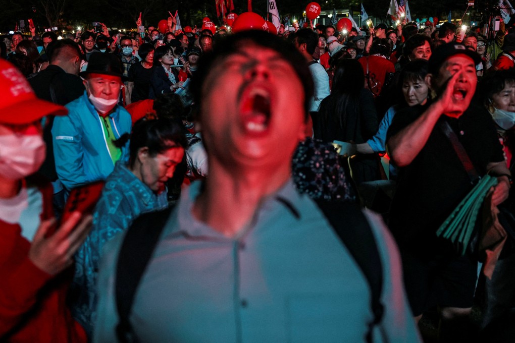 Supporters of Kim Moon-soo, the presidential candidate for South Korea’s conservative People Power Party, attend a campaign rally on Monday before the election. Photo: Reuters