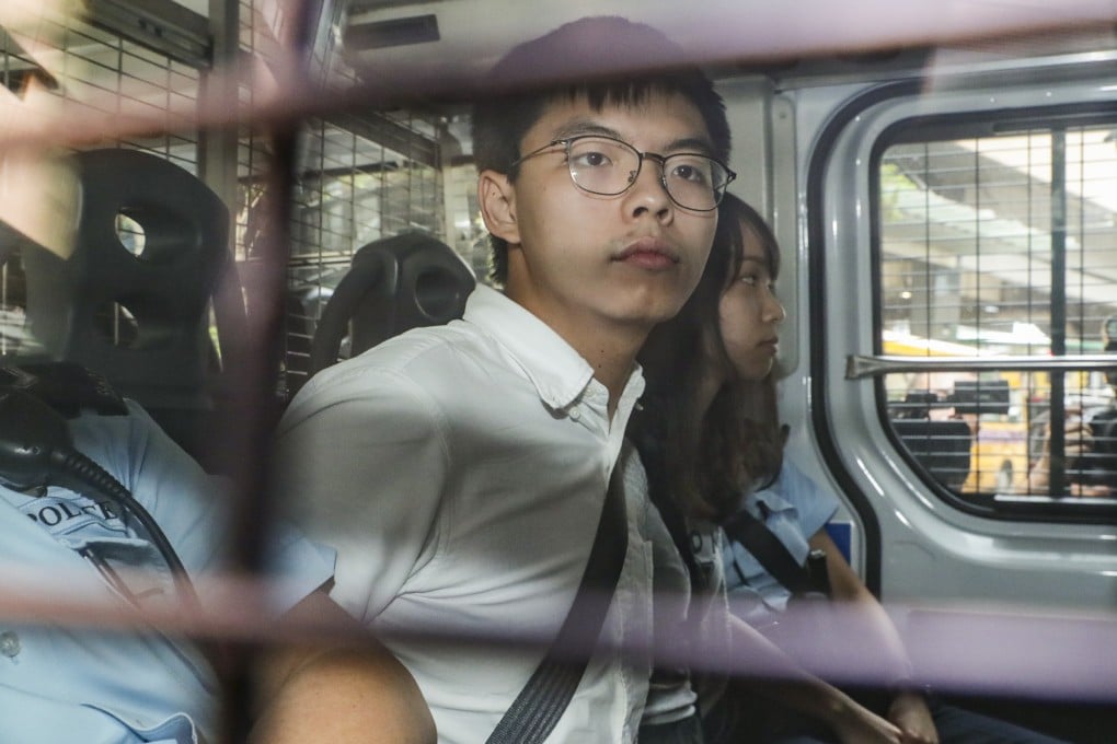 Joshua Wong arriving at court in 2019. He was jailed for 56 months for his role in a plot to overthrow the government through an unofficial legislative “primary” election in 2020. Photo: Edmond So
