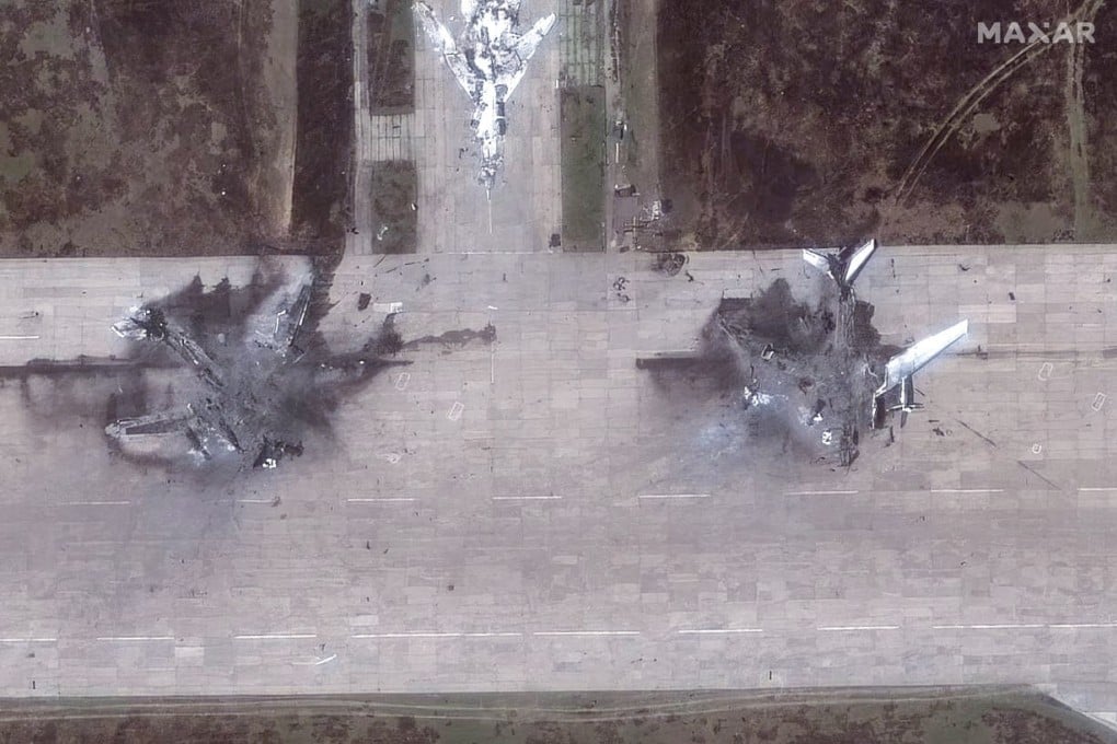 A satellite image shows destroyed TU 95 aircraft in the aftermath of a drone strike at the Belaya air base. Photo: Handout via Reuters