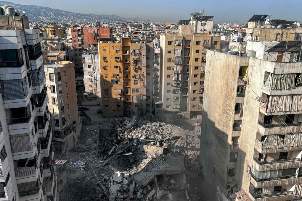 The rubble of a collapsed building hit by an overnight Israeli air strike in the Qaem neighbourhood of Beirut’s southern suburbs. Photo: AFP