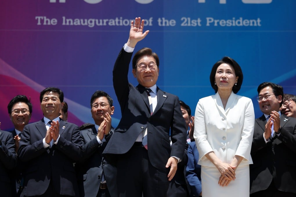 South Korean President Lee Jae-myung, standing alongside his wife, Kim Hye-kyung, waves after attending his inauguration ceremony in Seoul on June 4. Lee and his progressive Democratic Party are largely regarded as more friendly towards China and North Korea. Photo: EPA-EFE
