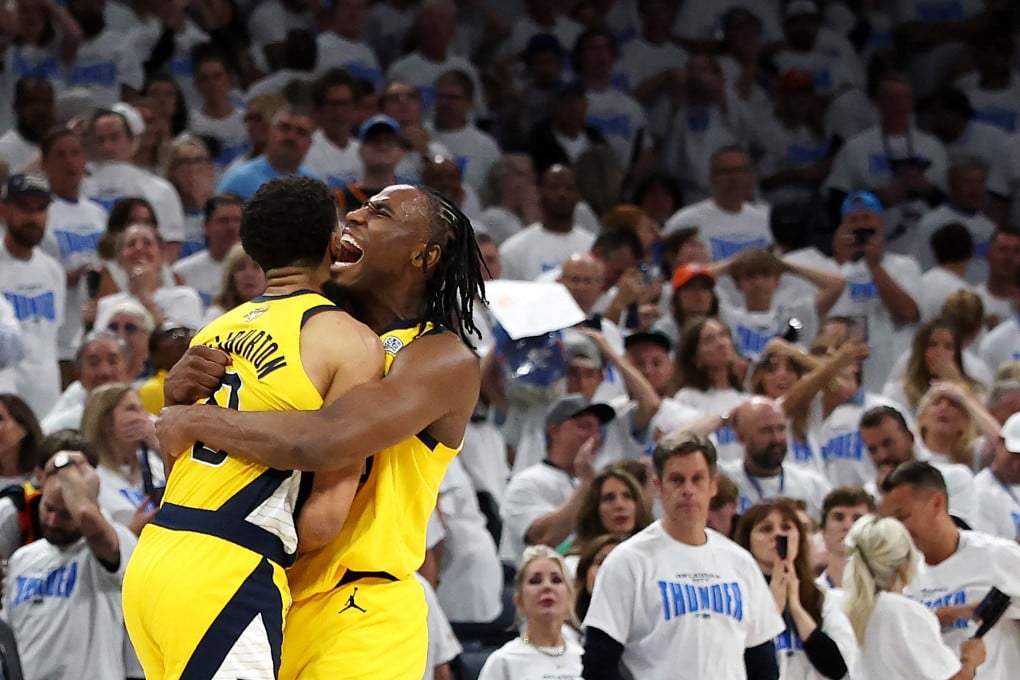 Tyrese Haliburton (left) is hugged by Indiana Pacers teammate Aaron Nesmith after scoring a late winner against Oklahoma City Thunder. Photo: AFP