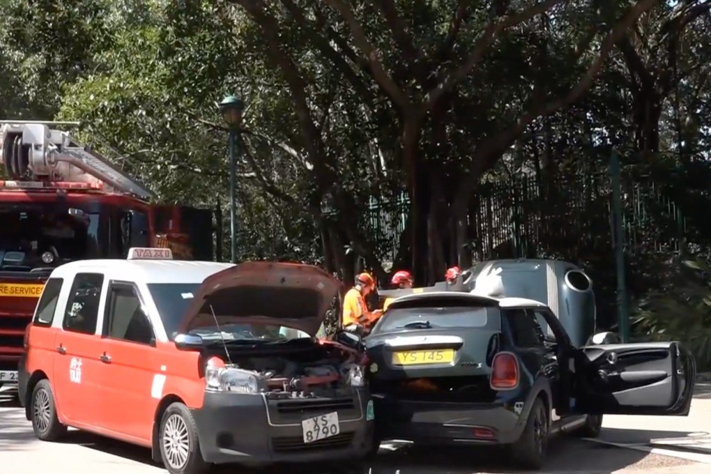 Rescuers on site at the scene of the crash on Magic Road. Photo: Handout